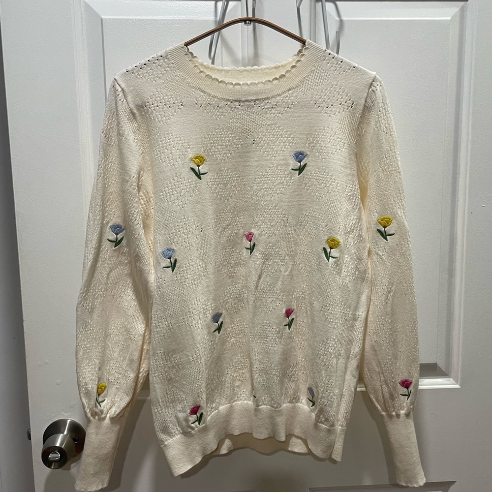 Embroidered sweater.